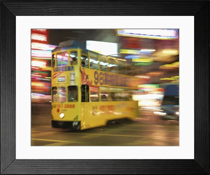 Framed Print : Tram in blurred motion at dusk, Causeway Bay, Hong Kong, China, Asia Framed Print : Tram in blurred motion at dusk, Causeway Bay, Hong Kong, China, Asia