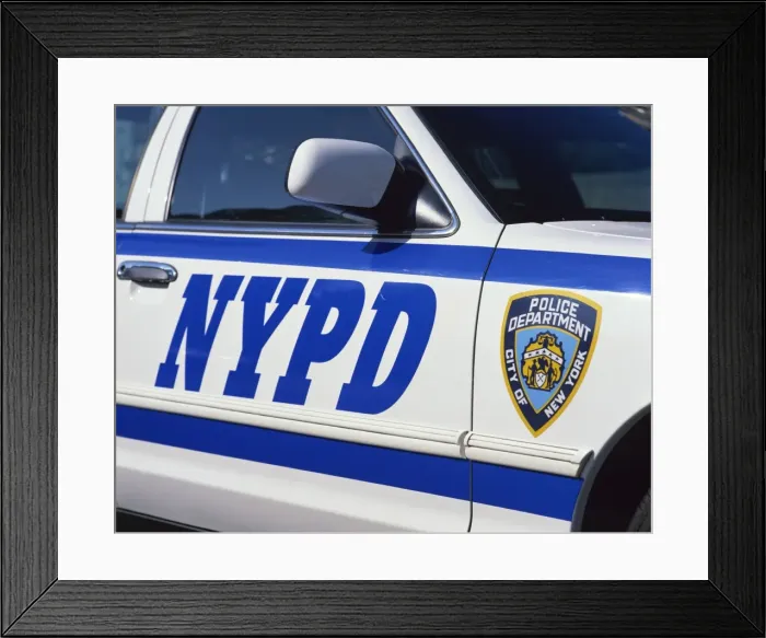 Framed Print : Close-up of police car with insignia of the City of New York Police Department Framed Print : Close-up of police car with insignia of the City of New York Police Department