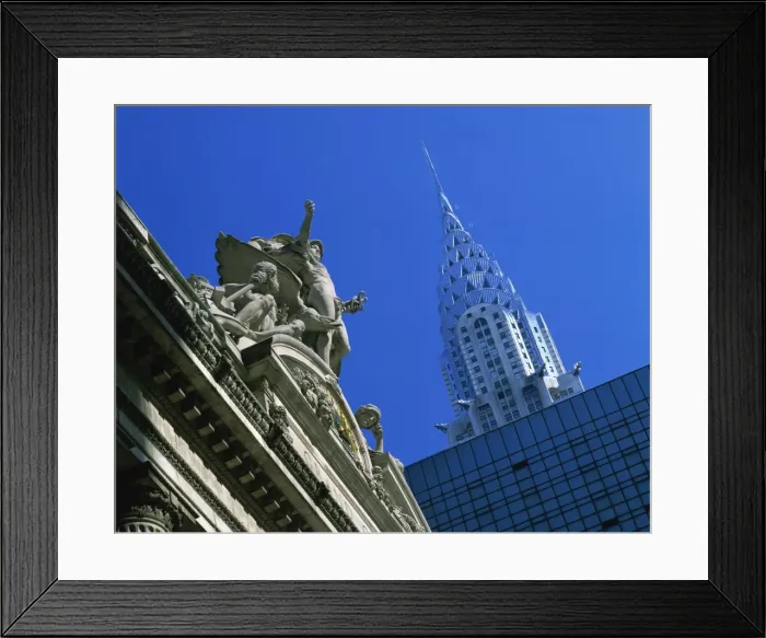 Framed Print : Close-up of statues on top of Grand Central Station, with the Chrysler Building in the background Framed Print : Close-up of statues on top of Grand Central Station, with the Chrysler Building in the background