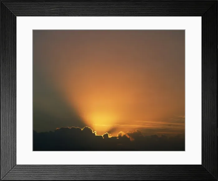Framed Print : Rays of light bursting out of dark clouds Framed Print : Rays of light bursting out of dark clouds