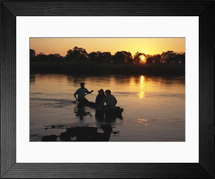 Framed Print : Mokoro river trip at sunset, Popa Falls, Caprivi Strip, Namibia, Africa Framed Print : Mokoro river trip at sunset, Popa Falls, Caprivi Strip, Namibia, Africa