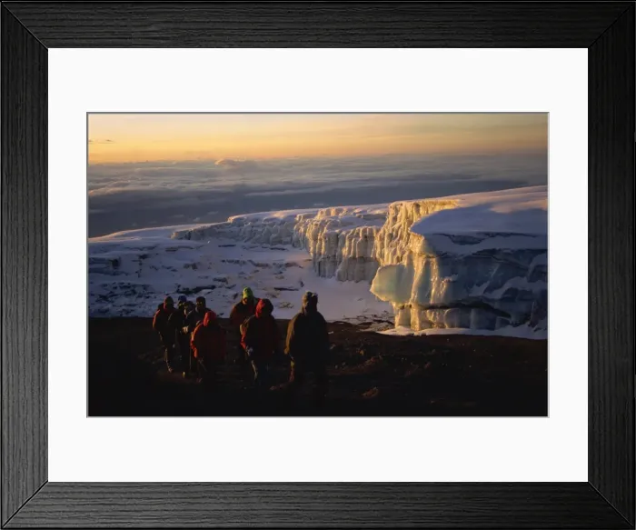 Framed Print : Trekkers and glacier at sunrise on summit of Kibo, 5895m, Kilimanjaro National Park Framed Print : Trekkers and glacier at sunrise on summit of Kibo, 5895m, Kilimanjaro National Park