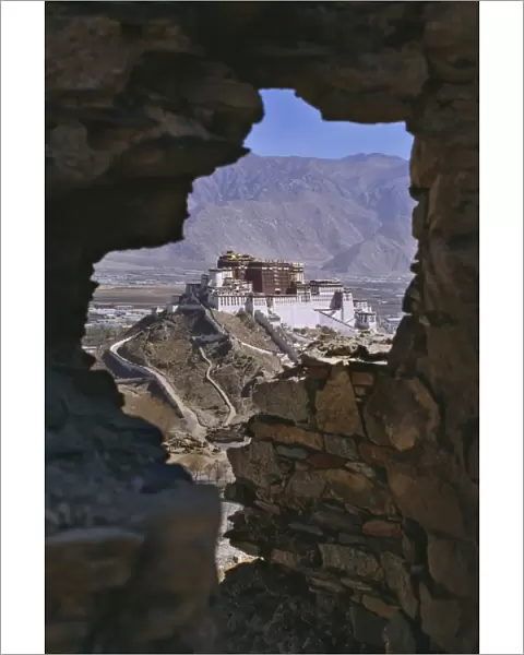 Potala Palace, UNESCO World Heritage Site, seen through ruined fort window