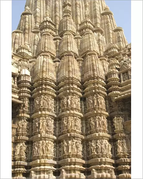 Detail of the main spire with some of the 646 erotic figures carved in sandstone on the Kandariya Mahadeva Temple, largest of the Chandela temples, within Western Group, Khajuraho, UNESCO World Heritage Site, Madhya Pradesh state