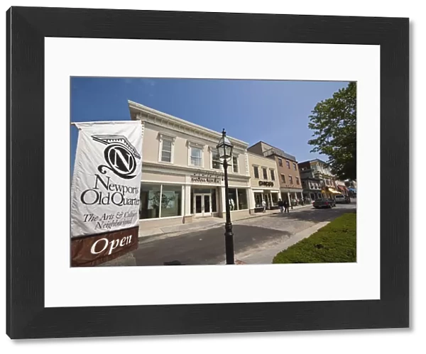 Newport Old Quarter sign and the smart shops and cobbled roadway of popular Thames Street in historic Newport, Rhode Island, New England, United States of America