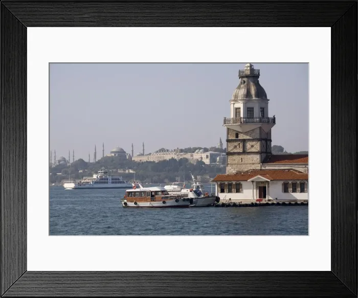 Framed Print : Maidens tower (Kizkulesi), former tollbooth in Bosphorus, with Topkapi palace Framed Print : Maidens tower (Kizkulesi), former tollbooth in Bosphorus, with Topkapi palace