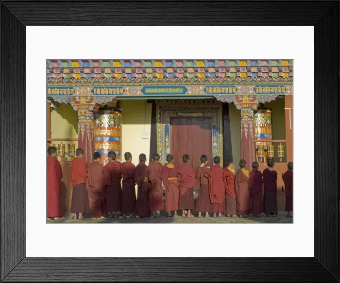 Framed Print : Novice monks line up in front of monastic building at the new Karma Theckhling Monastery Framed Print : Novice monks line up in front of monastic building at the new Karma Theckhling Monastery