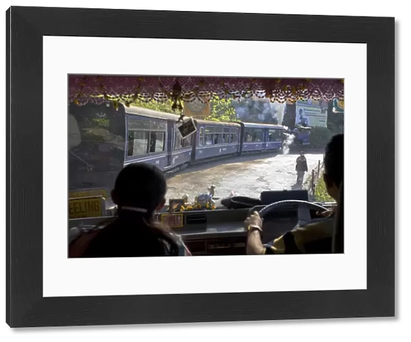View looking through windscreen of bus at Steam train (Toy Train), Darjeeling