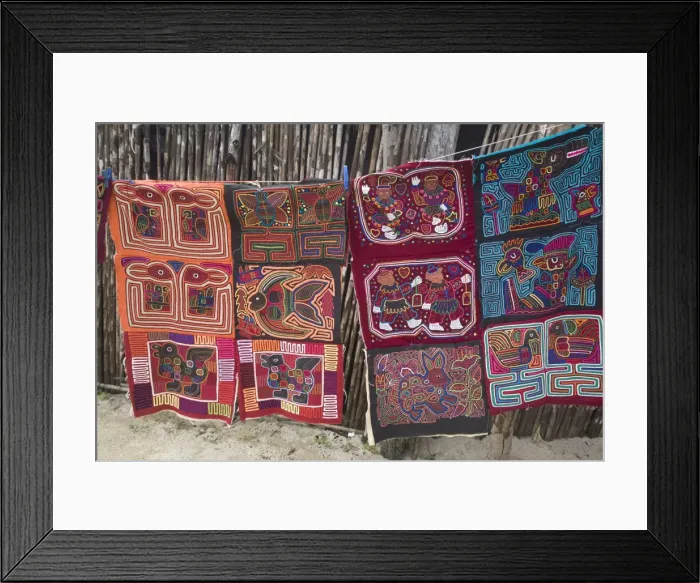 Framed Print : Molas hanging up for sale outside thatched house, Isla Tigre, San Blas Islands Framed Print : Molas hanging up for sale outside thatched house, Isla Tigre, San Blas Islands