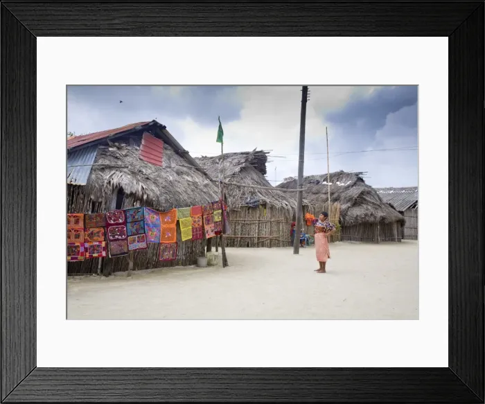 Framed Print : Molas hanging up for sale outside thatched houses, Isla Tigre, San Blas Islands Framed Print : Molas hanging up for sale outside thatched houses, Isla Tigre, San Blas Islands