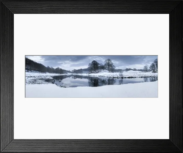 Framed Print : Winter view of River Brathay at dawn, under snow with reflections, near Elterwater Village Framed Print : Winter view of River Brathay at dawn, under snow with reflections, near Elterwater Village