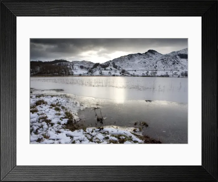 Framed Print : Frozen Little Langdale Tarn and snow-covered fells, near Ambleside, Lake District National Park Framed Print : Frozen Little Langdale Tarn and snow-covered fells, near Ambleside, Lake District National Park