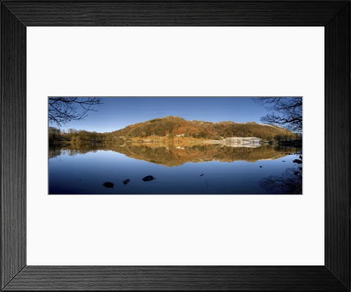 Framed Print : Panoramic winter view across Loughrigg Tarn with reflections, near Ambleside Framed Print : Panoramic winter view across Loughrigg Tarn with reflections, near Ambleside