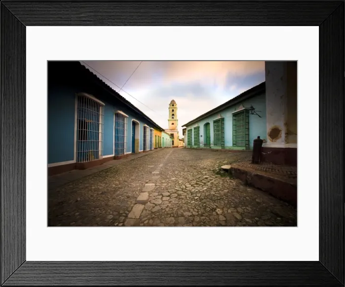 Framed Print : Deserted cobbled street looking towards the bell tower of the Inglesia y Convento de San Francisco off Plaza Major, Trinidad, Cuba, West Indies Framed Print : Deserted cobbled street looking towards the bell tower of the Inglesia y Convento de San Francisco off Plaza Major, Trinidad, Cuba, West Indies