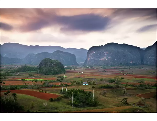 Dusk view across Vinales Valley showing limestone hills known as Mogotes