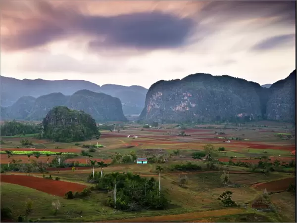 Dusk view across Vinales Valley showing limestone hills known as Mogotes