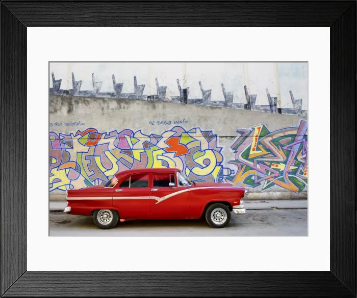 Framed Print : Classic red American car parked in front of grafitti covered wall, Havana Framed Print : Classic red American car parked in front of grafitti covered wall, Havana
