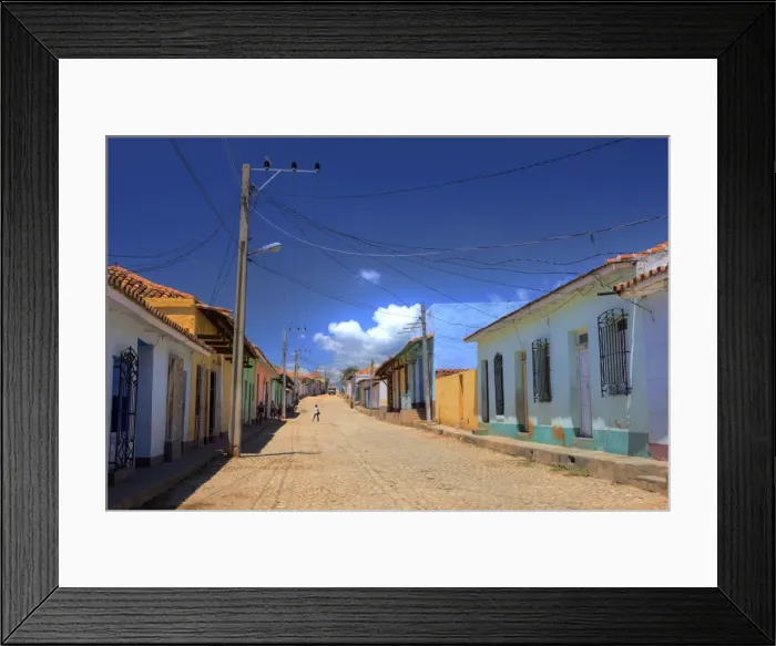 Framed Print : View along cobbled street lined with bright-painted houses, Trinidad, Cuba Framed Print : View along cobbled street lined with bright-painted houses, Trinidad, Cuba