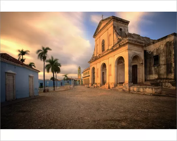 The church of the Holy Trinity bathed in evening light, Plaza Mayor, Trinidad