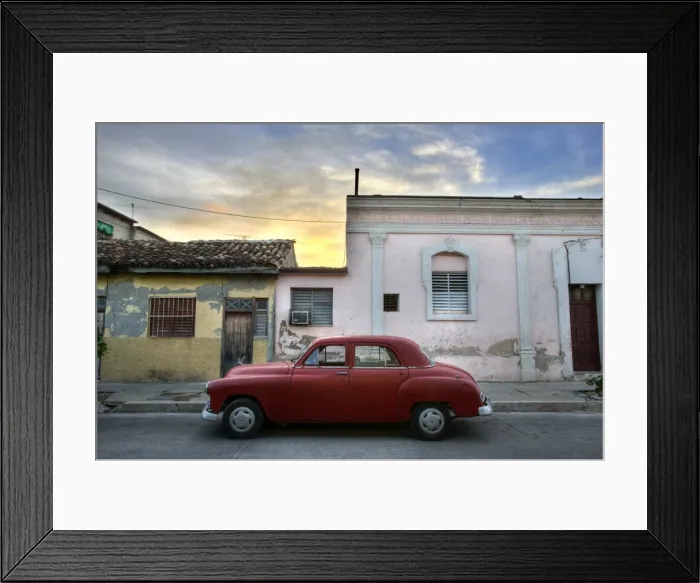 Framed Print : Classic red American car parked outside houses at sunset, Cienfuegos, Cuba Framed Print : Classic red American car parked outside houses at sunset, Cienfuegos, Cuba