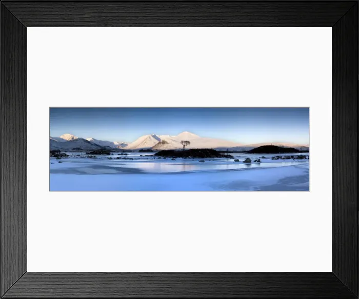 Framed Print : Winter view at dawn over frozen Lochain Na h Achlaise to sun-kissed Black Mount hills Framed Print : Winter view at dawn over frozen Lochain Na h Achlaise to sun-kissed Black Mount hills