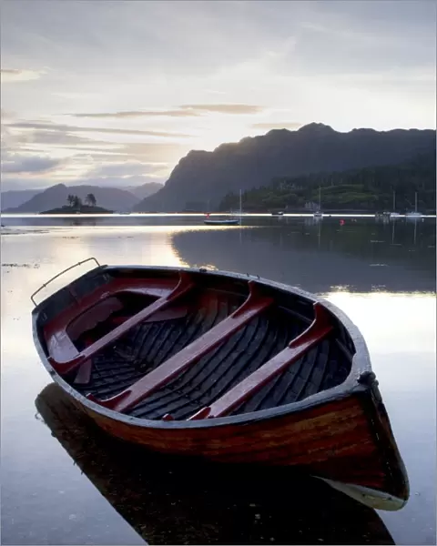 Rowing boat at low tide, dawn, Plokton, near Kyle of Lochalsh, Highland