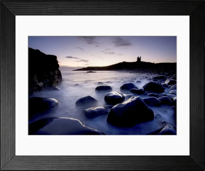 Framed Print : View across the Rumble Churn at dawn towards the ruins of Dunstanburgh Castle Framed Print : View across the Rumble Churn at dawn towards the ruins of Dunstanburgh Castle