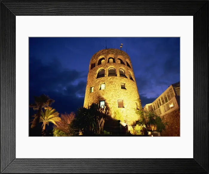 Framed Print : Harbourside watchtower illuminated at night, Puerto Banus, Marbella, Andalucia Framed Print : Harbourside watchtower illuminated at night, Puerto Banus, Marbella, Andalucia