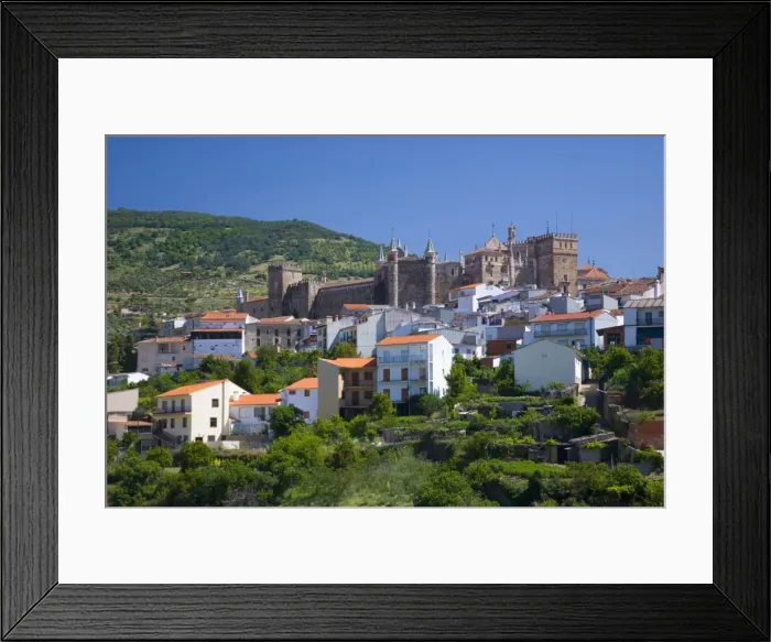 Framed Print : View of the village from valley, the Real Monasterio de Santa Maria de Guadalupe prominent Framed Print : View of the village from valley, the Real Monasterio de Santa Maria de Guadalupe prominent