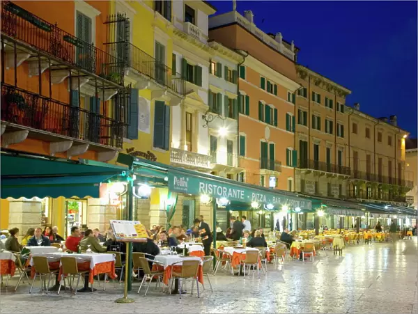 Typical restaurants overlooking Piazza Bra after dark, Verona, Veneto, Italy, Europe