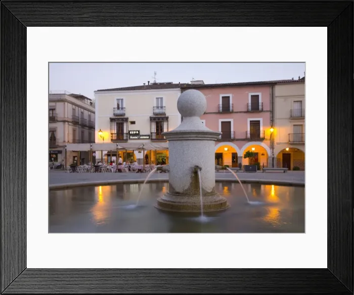 Framed Print : Fountain in the illuminated Plaza Mayor at dusk, Trujillo, Caceres, Extremadura Framed Print : Fountain in the illuminated Plaza Mayor at dusk, Trujillo, Caceres, Extremadura