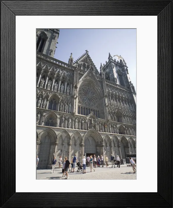 Framed Print : Exterior of the west front, with seagull flying over, Nidaros Cathedral Framed Print : Exterior of the west front, with seagull flying over, Nidaros Cathedral