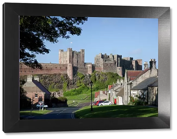 Bamburgh Castle and village of Bamburgh, Northumberland, England, United Kingdom, Europe