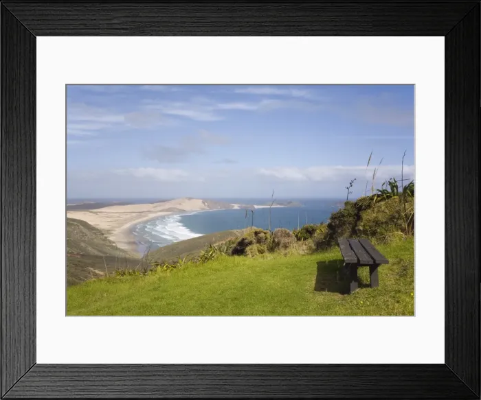 Framed Print : Bench by Cape Reinga Coastal Walkway on cliff top with view to Te Werahi Strand beach Framed Print : Bench by Cape Reinga Coastal Walkway on cliff top with view to Te Werahi Strand beach