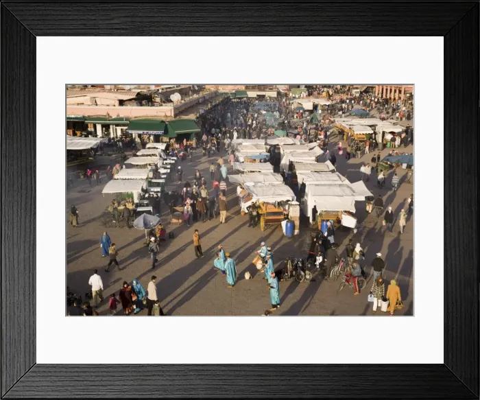 Framed Print : Aerial view of stalls, people and entertainers in busy Djemma el Fna square in the Medina Framed Print : Aerial view of stalls, people and entertainers in busy Djemma el Fna square in the Medina