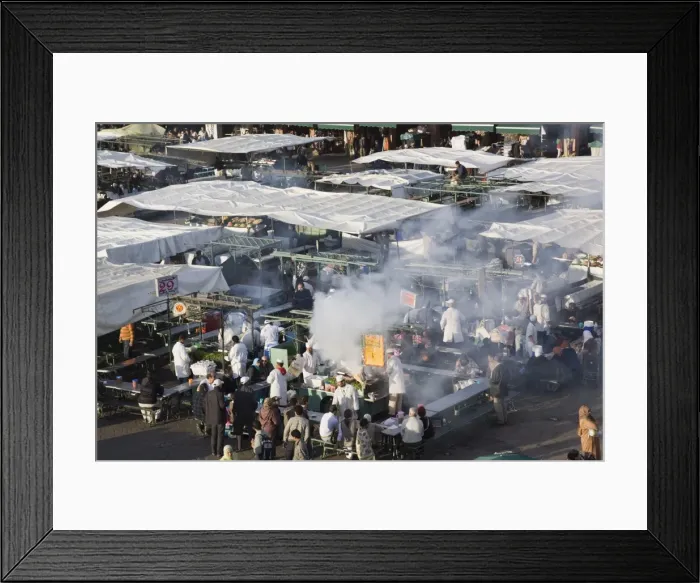 Framed Print : High view of food stalls, cooking and people in Djemma el Fna square in early evening in the Medina Framed Print : High view of food stalls, cooking and people in Djemma el Fna square in early evening in the Medina