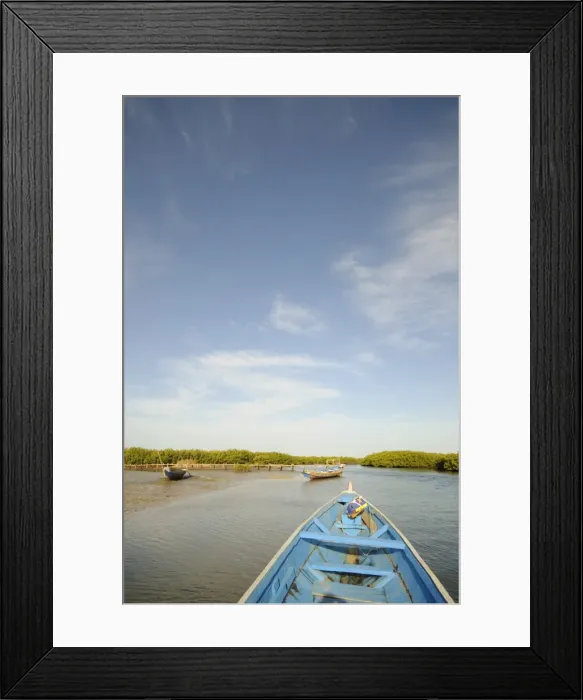Framed Print : Pirogue or fishing boat on the backwaters of the Sine Saloum Delta, Senegal Framed Print : Pirogue or fishing boat on the backwaters of the Sine Saloum Delta, Senegal