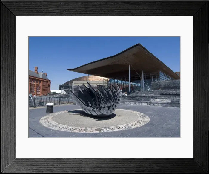 Framed Print : Seafarers War Memorial on the hull of a beached ship in front of the Senedd Framed Print : Seafarers War Memorial on the hull of a beached ship in front of the Senedd
