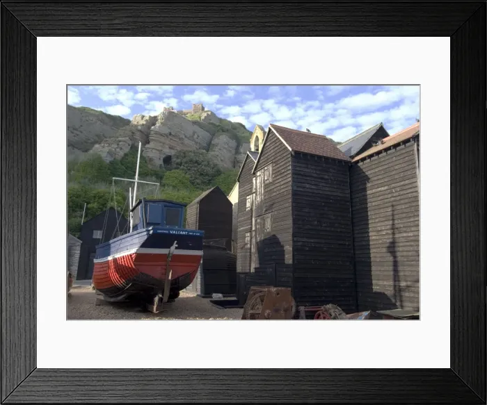 Framed Print : Fishing boat and historic buildings with Hastings Castle in the background