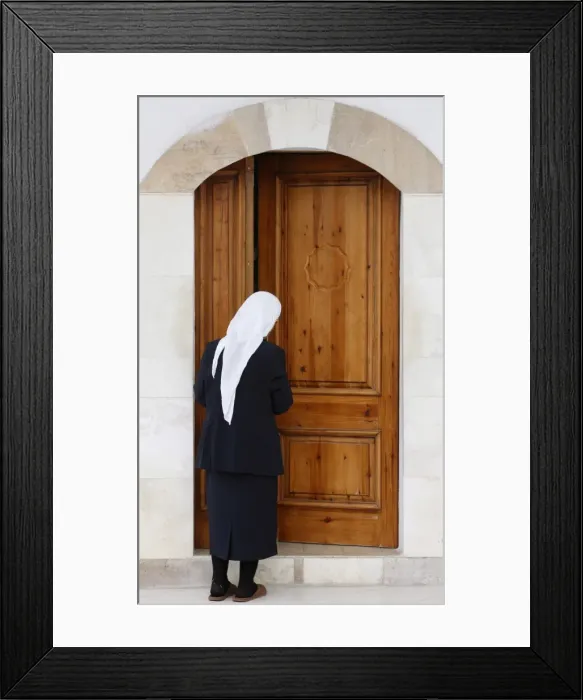 Framed Print : Bektachi woman opening the door of a turbe (shrine with saints tombs) Framed Print : Bektachi woman opening the door of a turbe (shrine with saints tombs)