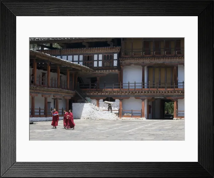 Framed Print : Monks walking in the court of the old Wangdue monastery, Bhutan, Asia Framed Print : Monks walking in the court of the old Wangdue monastery, Bhutan, Asia