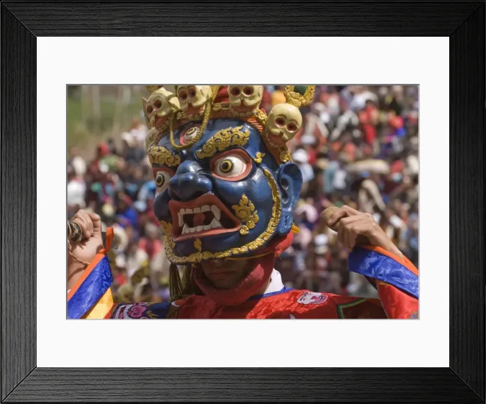 Framed Print : Masked dancer at religious festival with many visitors, Paro Tsechu, Paro, Bhutan, Asia Framed Print : Masked dancer at religious festival with many visitors, Paro Tsechu, Paro, Bhutan, Asia