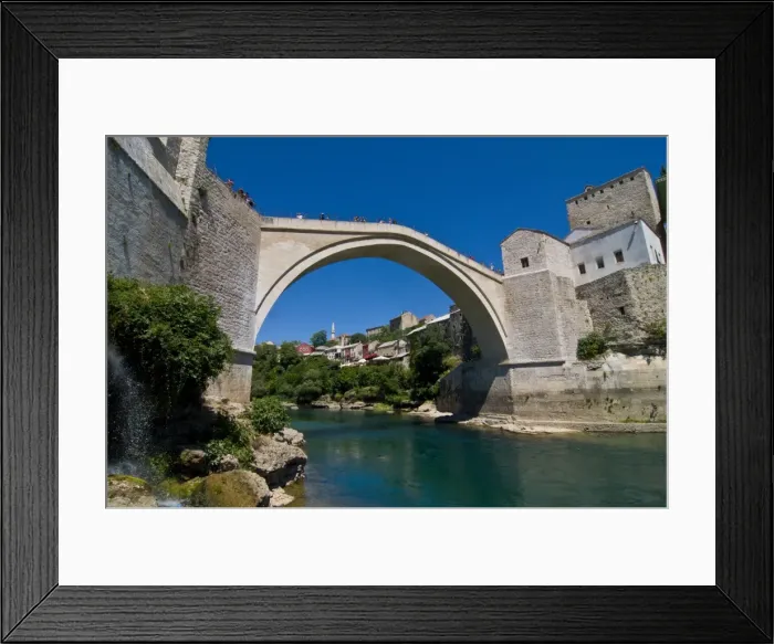 Framed Print : Famous old bridge reconstructed after collapsing in the war in the old town of Mostar Framed Print : Famous old bridge reconstructed after collapsing in the war in the old town of Mostar