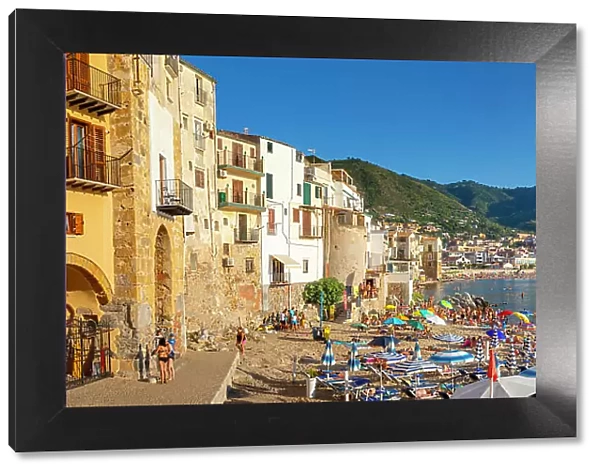 Panoramic view of tourists on beach, mountains in background, Cefalu, Province of Palermo, Sicily, Italy, Mediterranean, Europe