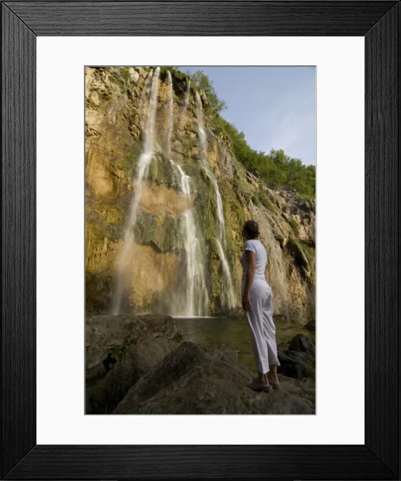 Framed Print : Woman looking at a giant waterfall, Plitvice Lakes National Park, UNESCO World Heritage Site Framed Print : Woman looking at a giant waterfall, Plitvice Lakes National Park, UNESCO World Heritage Site