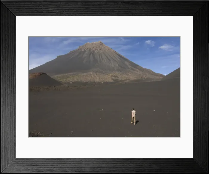 Framed Print : Man walking towards volcano on Fogo, Cape Verde Islands, Africa Framed Print : Man walking towards volcano on Fogo, Cape Verde Islands, Africa