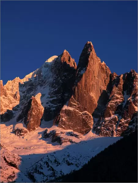 The celebrated peak of the Aiguille du Dru stands high above the village of Argentiere