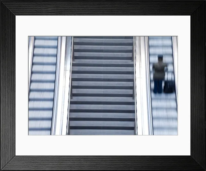 Framed Print : Escalator and stairs leading to the platform at modern train station, Berlin Framed Print : Escalator and stairs leading to the platform at modern train station, Berlin