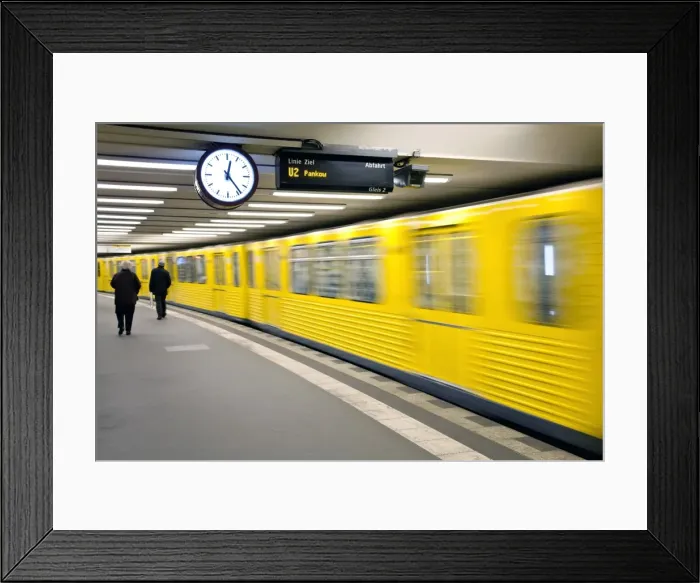 Framed Print : Moving train pulling into modern subway station, Berlin, Germany, Europe Framed Print : Moving train pulling into modern subway station, Berlin, Germany, Europe