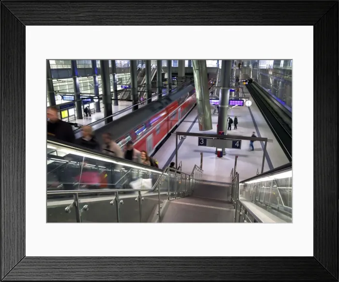 Framed Print : Moving train pulling into modern train station, Berlin, Germany, Europe Framed Print : Moving train pulling into modern train station, Berlin, Germany, Europe